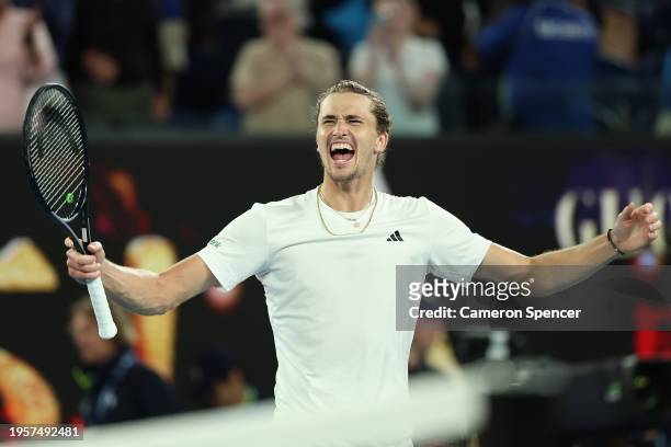 Alexander Zverev of Germany celebrates winning their quarterfinals singles match against Carlos Alcaraz of Spain during the 2024 Australian Open at...