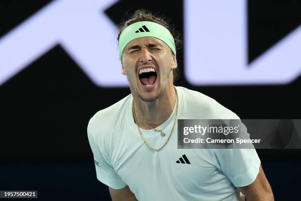 Alexander Zverev of Germany celebrates winning match point during their quarterfinals singles match against Carlos Alcaraz of Spain during the 2024...