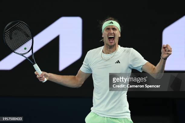 Alexander Zverev of Germany celebrates winning match point during their quarterfinals singles match against Carlos Alcaraz of Spain during the 2024...