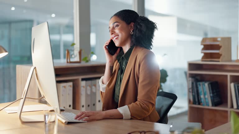 https://media.gettyimages.com/id/1957504091/video/woman-in-office-with-computer-smile-and-phone-call-feedback-report-or-web-article-at-digital.jpg?b=1&s=640x640&k=20&c=aLM9mxWGmLQ_CMNesp2OiQYcKQh9wDxMPwOm0Yz1L6I=