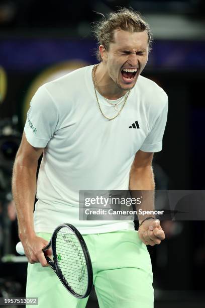 Alexander Zverev of Germany celebrates winning their quarterfinals singles match against Carlos Alcaraz of Spain during the 2024 Australian Open at...