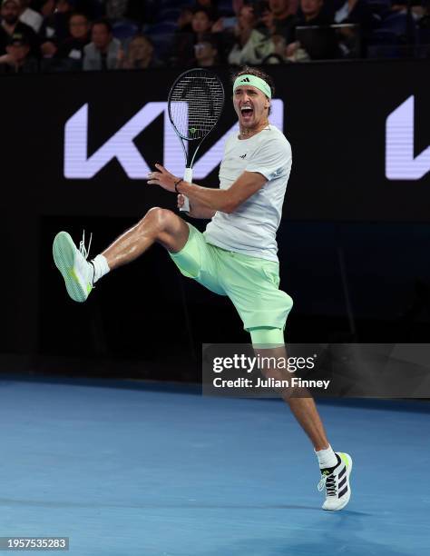 Alexander Zverev of Germany celebrates his win after their quarterfinals singles match against Carlos Alcaraz of Spain during the 2024 Australian...