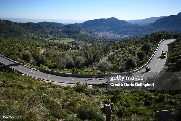 Simon Carr of The United Kingdom and Team EF Education - EasyPost and Pablo Castrillo of Spain and Team Equipo Kern Pharma attack during the 33rd...