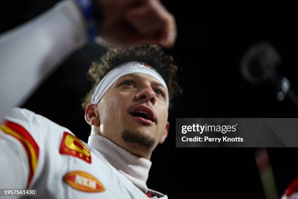 Patrick Mahomes of the Kansas City Chiefs leads a huddle prior to an NFL divisional round playoff football game against the Buffalo Bills at Highmark...