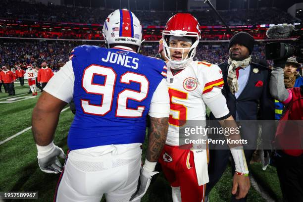 Patrick Mahomes of the Kansas City Chiefs talks with DaQuan Jones of the Buffalo Bills after an NFL divisional round playoff football game at...