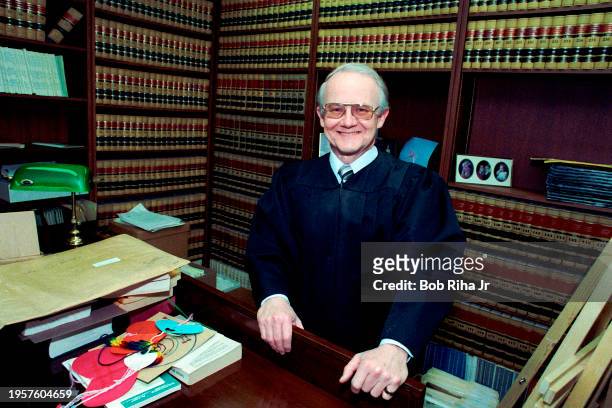 Los Angeles Superior Court Judge William R Pounders inside his Judge Chamber filled with books and boxes of documents related to the McMartin...