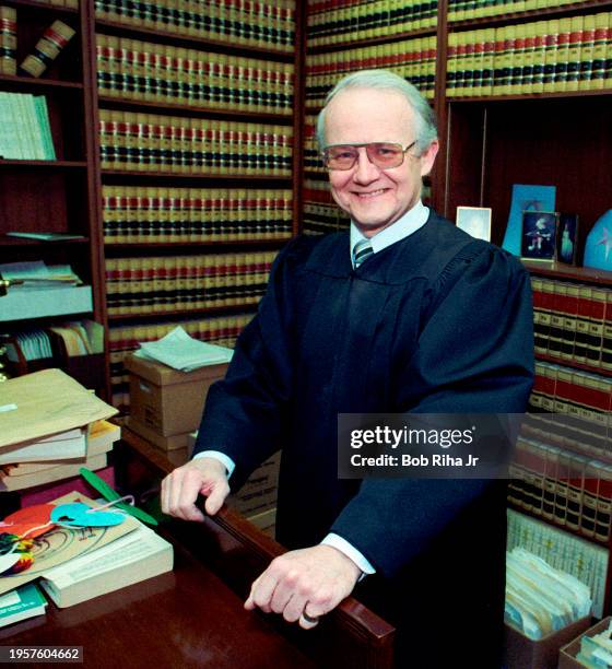 Los Angeles Superior Court Judge William R Pounders inside his Judge Chamber filled with books and boxes of documents related to the McMartin...