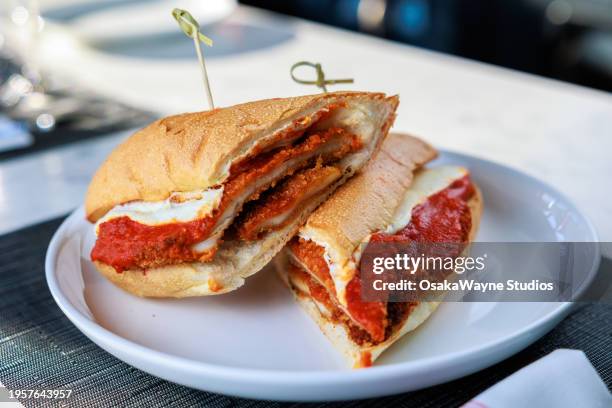 chicken parm sandwich - provolone stock-fotos und bilder