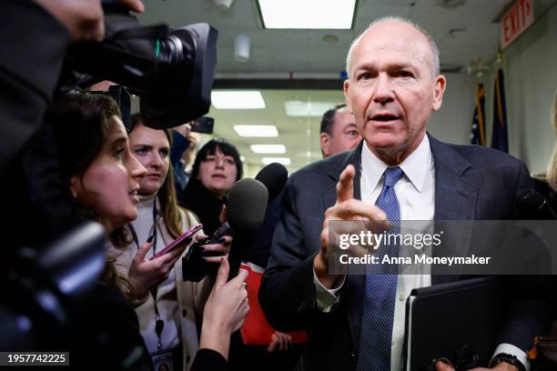Boeing CEO Dave Calhoun speaks to reporters as he departs from a meeting at the office of Sen. Mark Warner on Capitol Hill January 24, 2024 in...