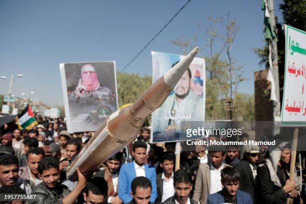 Yemenis lift Palestinian flag, placards depicting Houthi group leader Abdul-Malik Badreddin al-Houthi, Abu Obaida, the spokesperson of Hamas' armed...