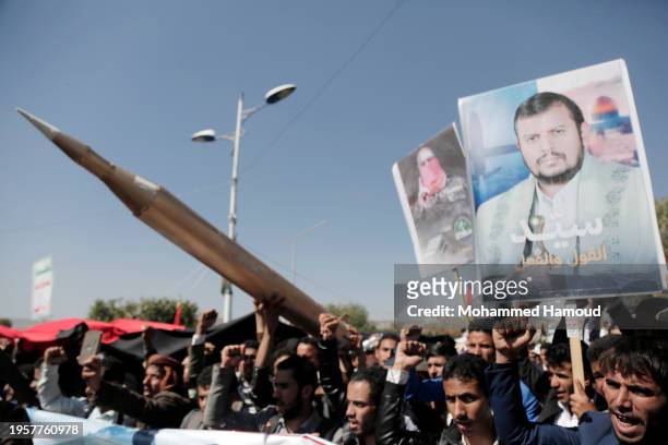 Yemenis lift Palestinian flag, placards depicting Houthi group leader Abdul-Malik Badreddin al-Houthi, Abu Obaida, the spokesperson of Hamas' armed...