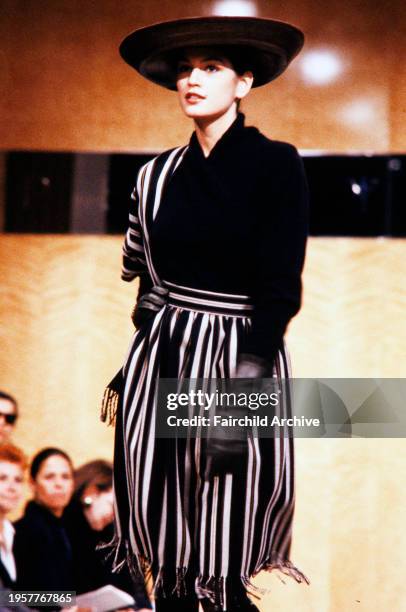 Model Cindy Crawford walks in the Perry Ellis Fall 1988 Ready to Wear Runway Show, in New York City.