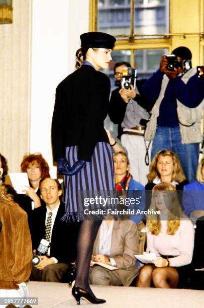 Model Cindy Crawford walks in the Perry Ellis Fall 1988 Ready to Wear Runway Show, in New York City.