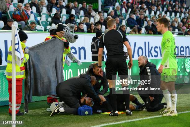 January 2024, Lower Saxony, Wolfsburg: Soccer, Bundesliga, VfL Wolfsburg - 1. FC Köln, Matchday 19, Volkswagen Arena. Assistant referee Thorben...