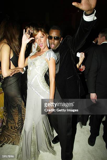 Model Gisele Bundchen and Sean "P. Diddy" Combs attend the Costume Institute Benefit Gala sponsored by Gucci April 28, 2003 at The Metropolitan...