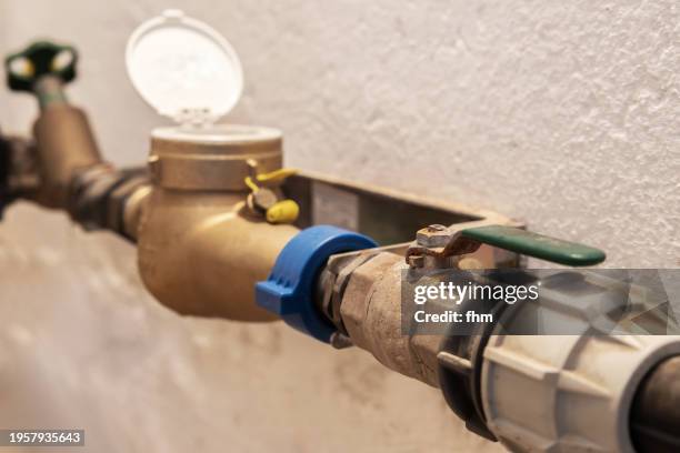 water meter with shut-off valves - ventil stock-fotos und bilder