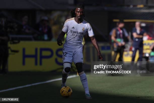 Real Madrid's French midfielder Eduardo Camavinga runs with the ball during the Spanish league football match between UD Las Palmas and Real Madrid...