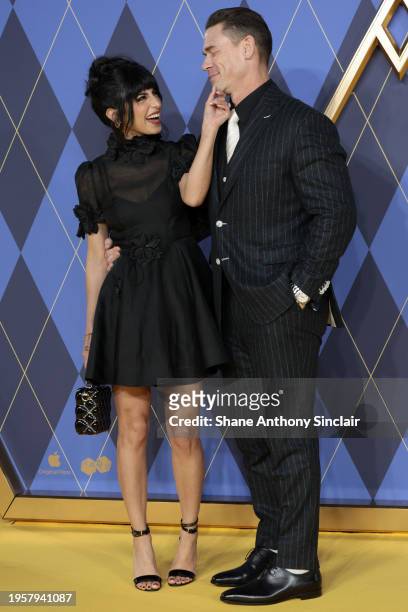 Shay Shariatzadeh and John Cena attend the World Premiere of "Argylle" at the Odeon Luxe Leicester Square on January 24, 2024 in London, England.