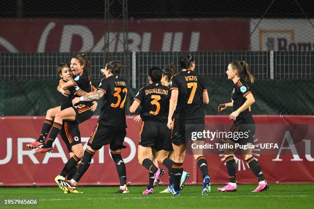 Valentina Giacinti of AS Roma celebrates with teammates after scoring her team's first goal during the UEFA Women's Champions League group stage...