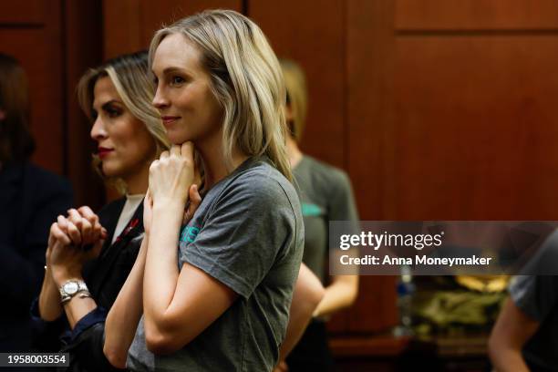 Actor Candice King applauds alongside other activists after a roundtable on gun legislation at the U.S. Capitol Building on January 24, 2024 in...