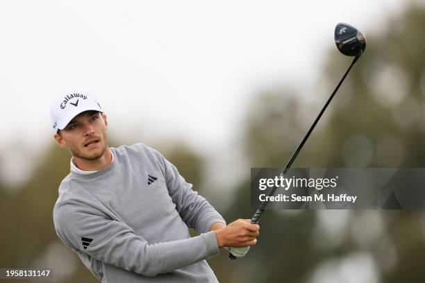 Nicolai Hojgaard of Denmark hits his shot from the second tee during the first round of the Farmers Insurance Open on the Torrey Pines South Course...