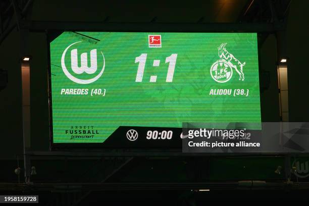 January 2024, Lower Saxony, Wolfsburg: Soccer, Bundesliga, VfL Wolfsburg - 1. FC Köln, Matchday 19, Volkswagen Arena. View of the scoreboard with the...