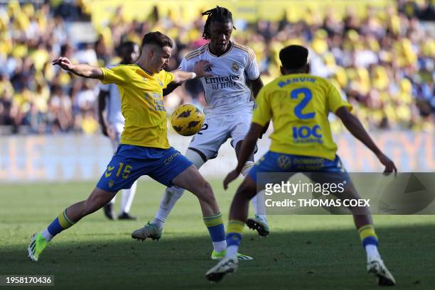 Las Palmas' Spanish defender Mika Marmol fights for the ball with Real Madrid's French midfielder Eduardo Camavinga during the Spanish league...