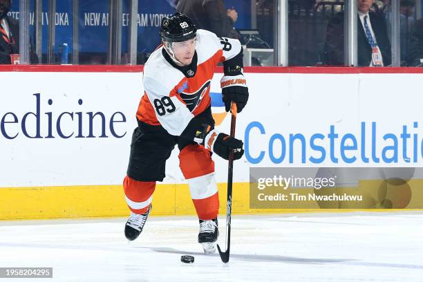 Cam Atkinson of the Philadelphia Flyers skates with the puck against the Tampa Bay Lightning at the Wells Fargo Center on January 23, 2024 in...