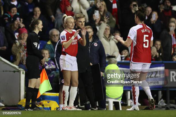 Leah Williamson of Arsenal is substituted on for teammate Jennifer Beattie during the FA Women's Continental Tyres League Cup match between Reading...