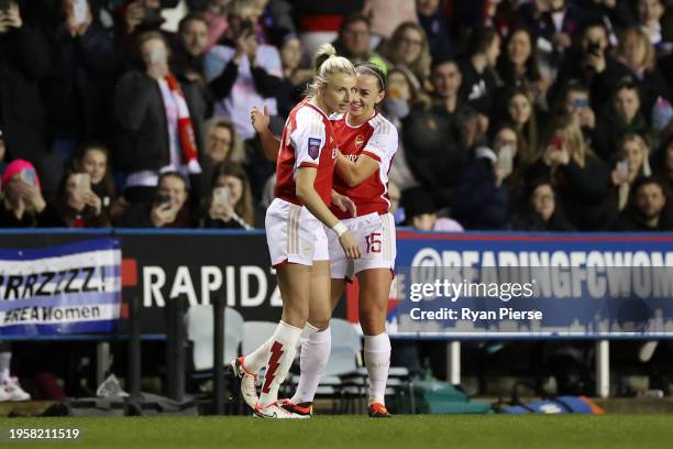 Leah Williamson of Arsenal is embraced by teammate Katie McCabe after being substituted on during the FA Women's Continental Tyres League Cup match...