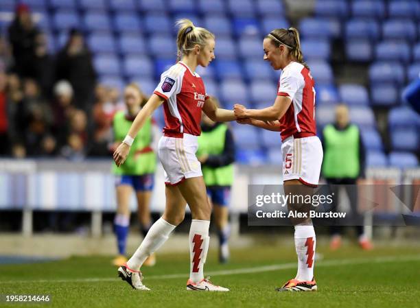 Leah Williamson of Arsenal is passed the captain's armband by teammate Katie McCabe after being substituted on during the FA Women's Continental...