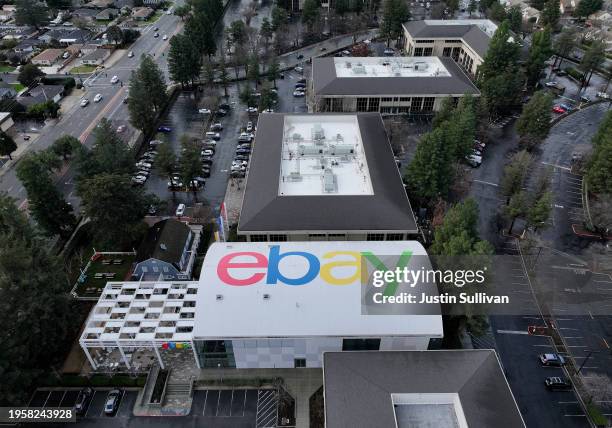 In an aerial view, the eBay logo is displayed on the roof of eBay headquarters on January 24, 2024 in San Jose, California. EBay announced plans to...