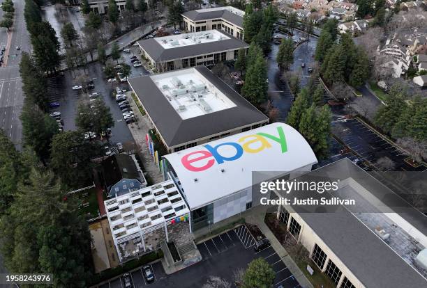 In an aerial view, the eBay logo is displayed on the roof of eBay headquarters on January 24, 2024 in San Jose, California. EBay announced plans to...