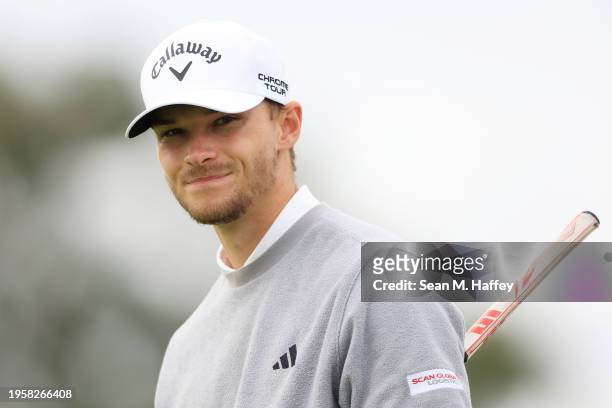 Nicolai Hojgaard of Denmark looks on during the first round of the Farmers Insurance Open on the Torrey Pines South Course on January 24, 2024 in La...