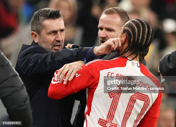 Dispute between Leroy Sane of Bayern Muenchen and Nenad Bjelica Coach of FC Union Berlin during the Bundesliga match between FC Bayern München and 1....