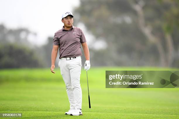 Kevin Yu of Taiwan plays a shot on the second hole during the first round of the Farmers Insurance Open on the Torrey Pines North Course on January...