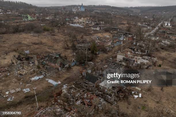 This aerial photograph shows destroyed houses in the village of Bohorodychne, Donetsk region, on January 27 amid the Russian invasion of Ukraine....