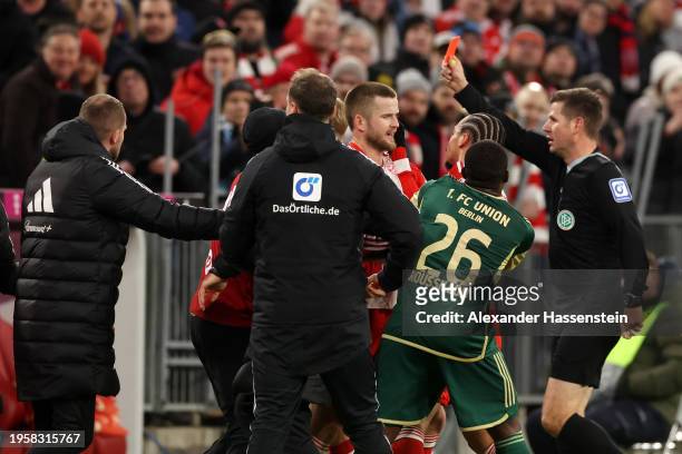 Nenad Bjelica, Head Coach of 1.FC Union Berlin, is shown a red card during the Bundesliga match between FC Bayern München and 1. FC Union Berlin at...