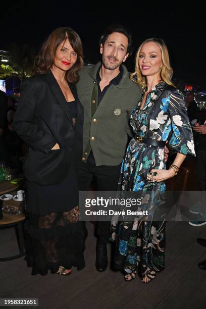 Helena Christensen, Adrien Brody and Georgina Chapman attend day two of the Formula E World Championships 2024 Diriyah E-Prix on January 27, 2024 in...