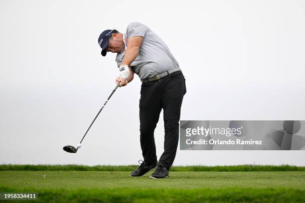 Ryan Fox of New Zealand hits his shot from the 11th tee during the first round of the Farmers Insurance Open on the Torrey Pines North Course on...