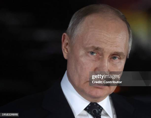 Russian President Vladimir Putin talks during a concert at the Gazprom Arena Stadium, marking the 80th anniversary of the end of the Siege of...