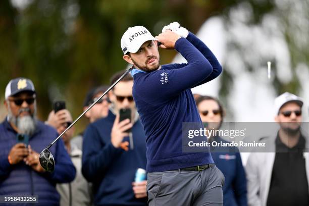 Patrick Cantlay of the United States hits his shot from the ninth tee during the first round of the Farmers Insurance Open on the Torrey Pines North...