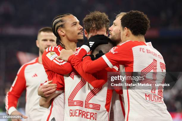 Raphael Guerreiro of Bayern Muenchen celebrates as he scores the goal 1:0 with Leroy Sane of Bayern Muenchen Leon Goretzka of Bayern Muenchen Jamal...