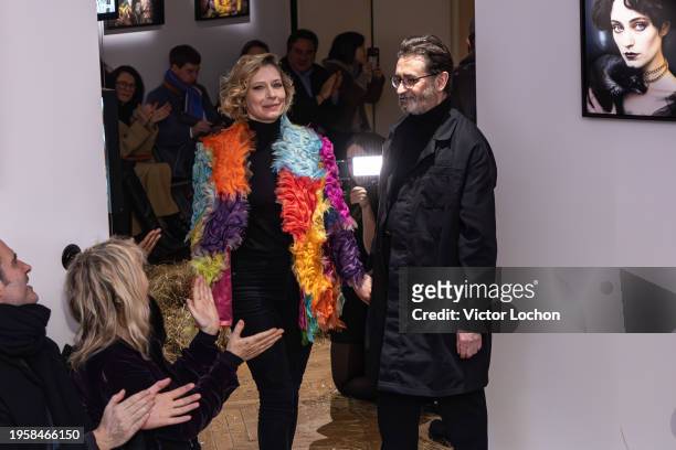 Ophelia Kolb and designer Franck Sorbier walk the runway during the Franck Sorbier Haute Couture Spring/Summer 2024 fashion show as part of Paris...