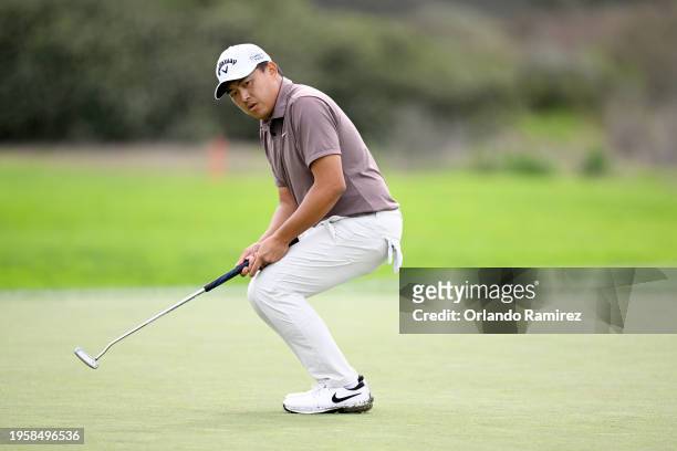 Kevin Yu of Taiwan reacts to a missed putt on the second green during the first round of the Farmers Insurance Open on the Torrey Pines North Course...