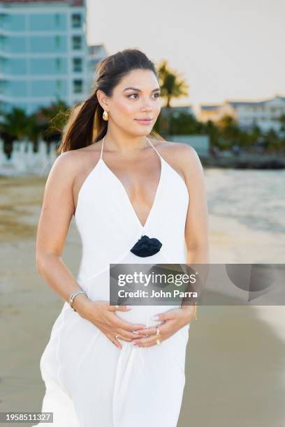 Giannina Gibelli escapes the cold to bask in the warm Caribbean sun as they celebrate their Babymoon at the new Sandals Dunn’s River in Jamaica on...