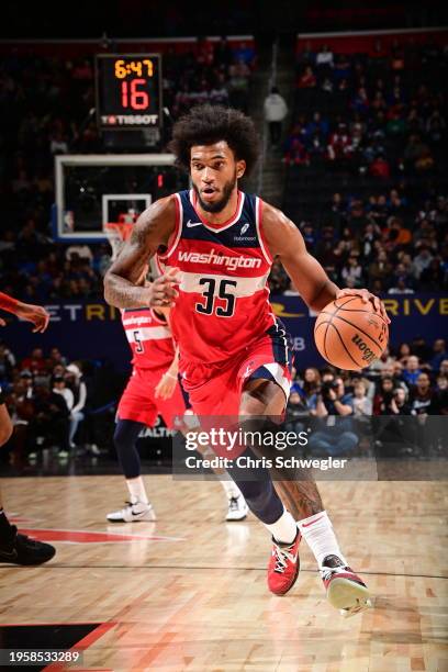 Marvin Bagley III of the Washington Wizards dribbles the ball during the game against the Detroit Pistons on January 27, 2024 at Little Caesars Arena...
