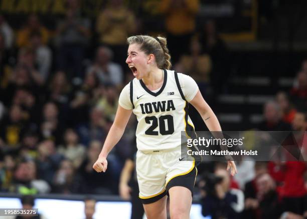Guard Kate Martin of the Iowa Hawkeyes celebrates after a basket during the first half against the Nebraska Cornhuskers at Carver-Hawkeye Arena on...