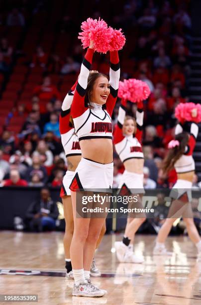 The Louisville Cardinals Cheerleaders preform during a mens college basketball game between the Virginia Cavaliers and the Louisville Cardinals on...
