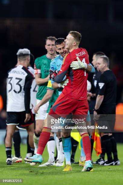 Martin Dúbravka of Newcastle United embraces Marek Rodák of Fulham following the Emirates FA Cup Fourth Round match between Fulham and Newcastle...